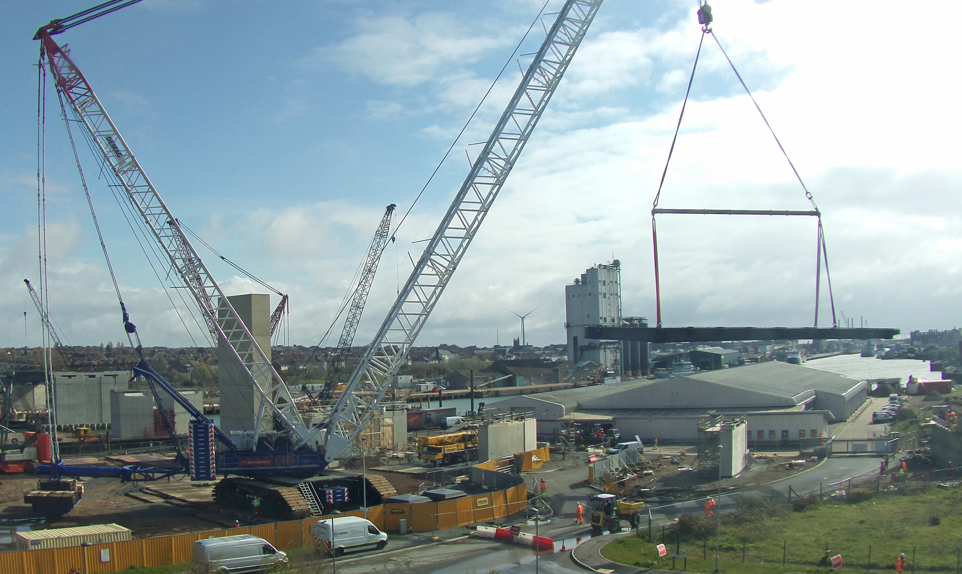 The giant Terex Demag CC8800-1 unloading the Gull Wing bridge SAV sections from the barge. (Image: CHPV Offshore Film & Photography)