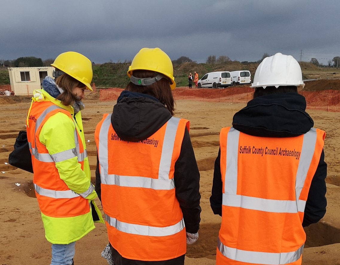SCCAS Staff looking at an open trench