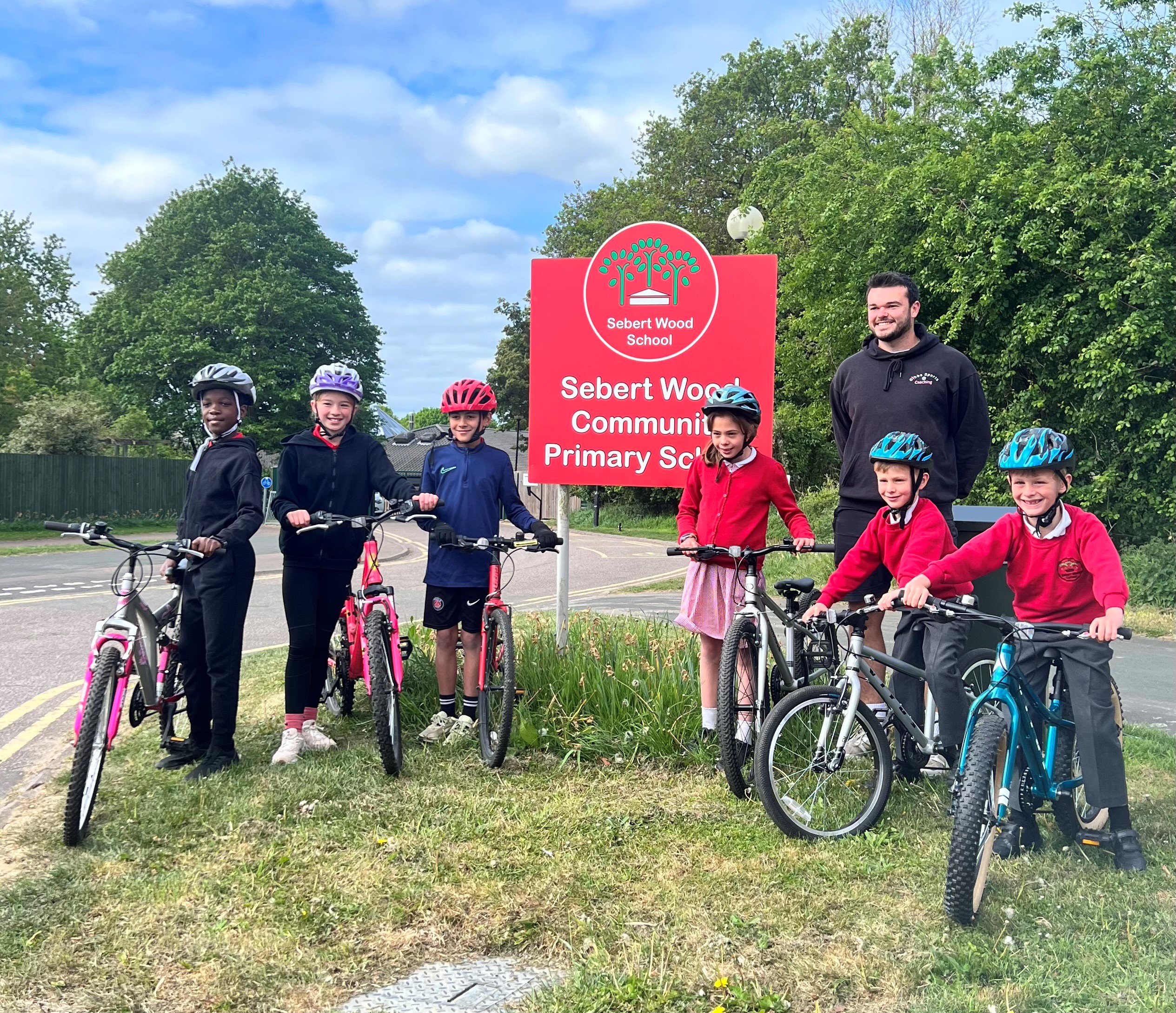 A group of school children on bicycles 