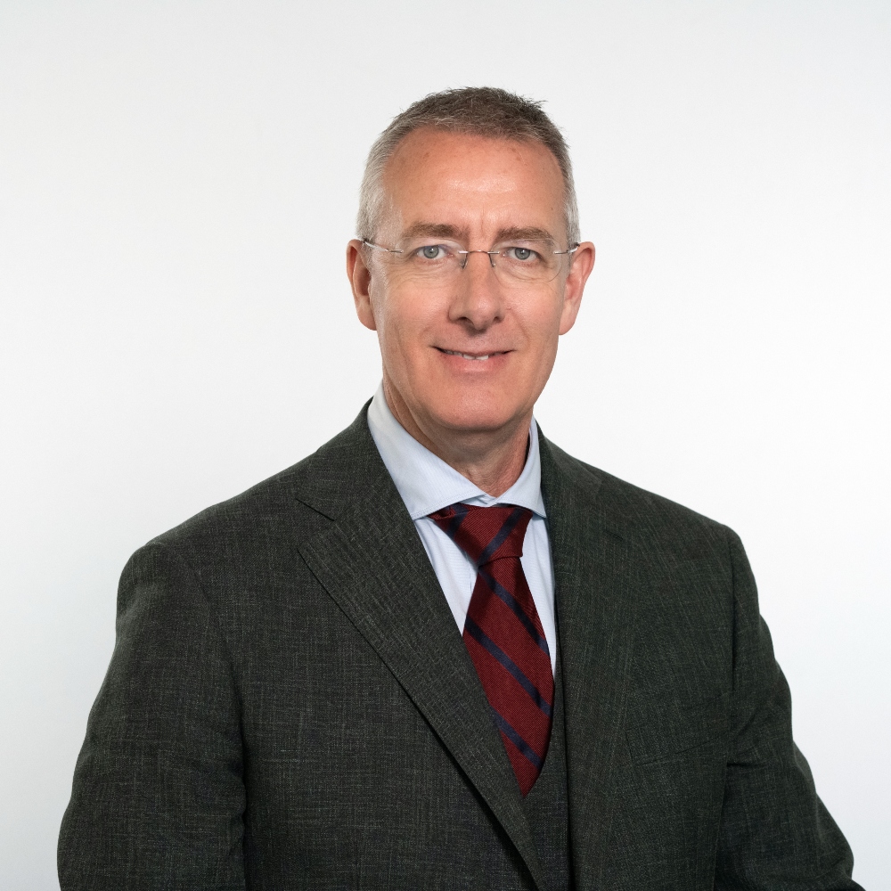 Cllr Simon Aalders wearing suit and tie