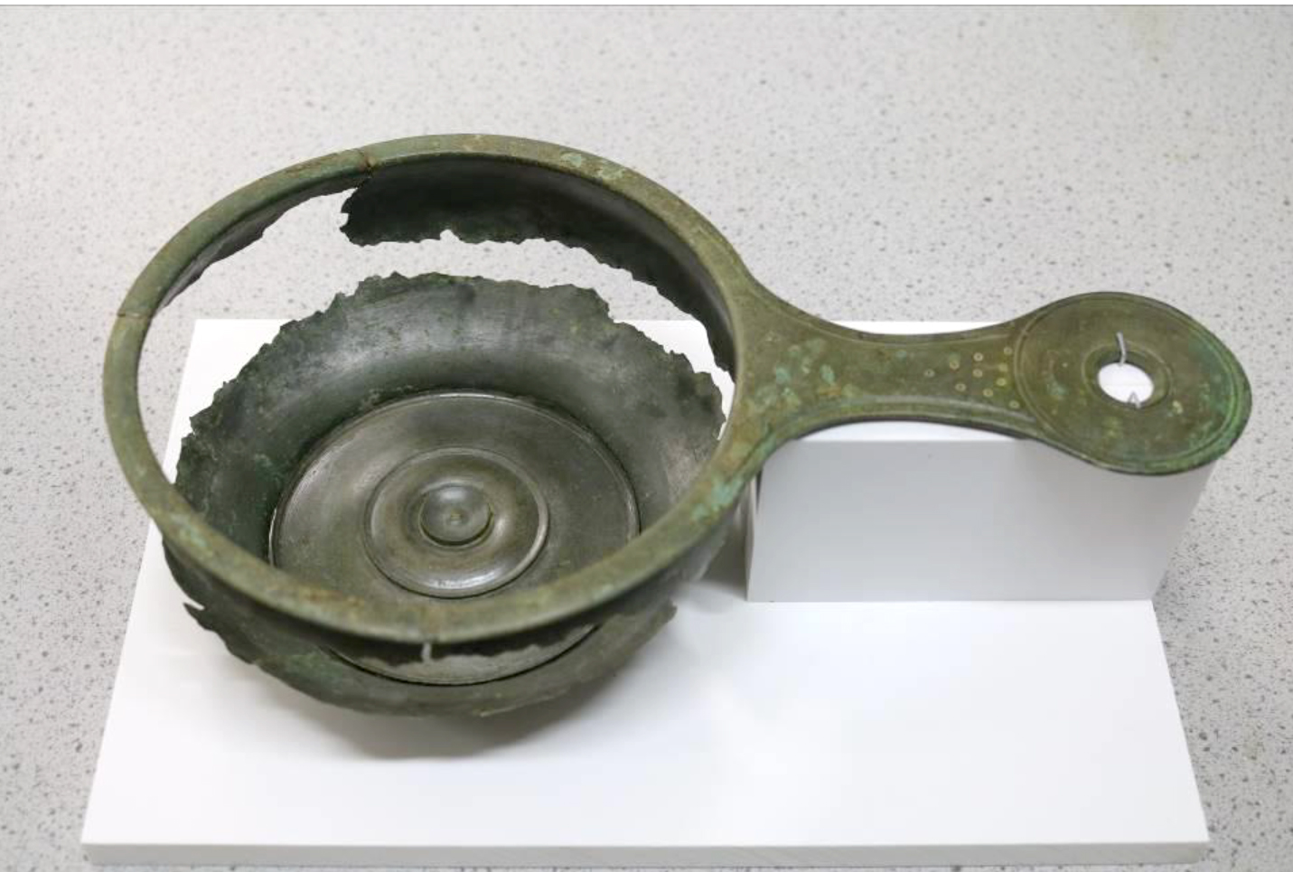 The Roman pan after micro-excavation and conservation
