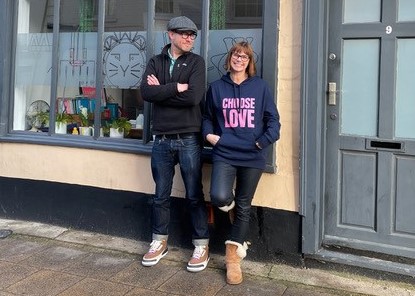 Tim and Wendy stood outside their office building