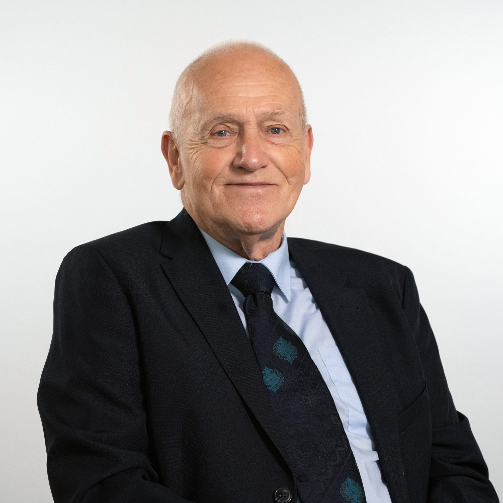 Cllr Trevor Lailey wearing suit and tie