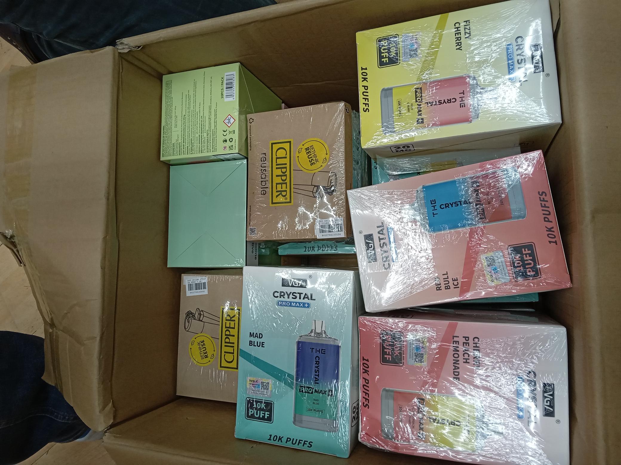 Seized vapes in a cardboard box