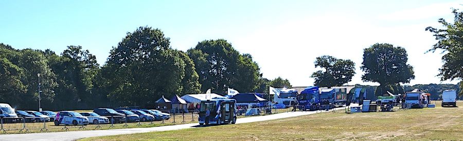 EVEX featuring the self-driving bus on the track, with show cars around it. 